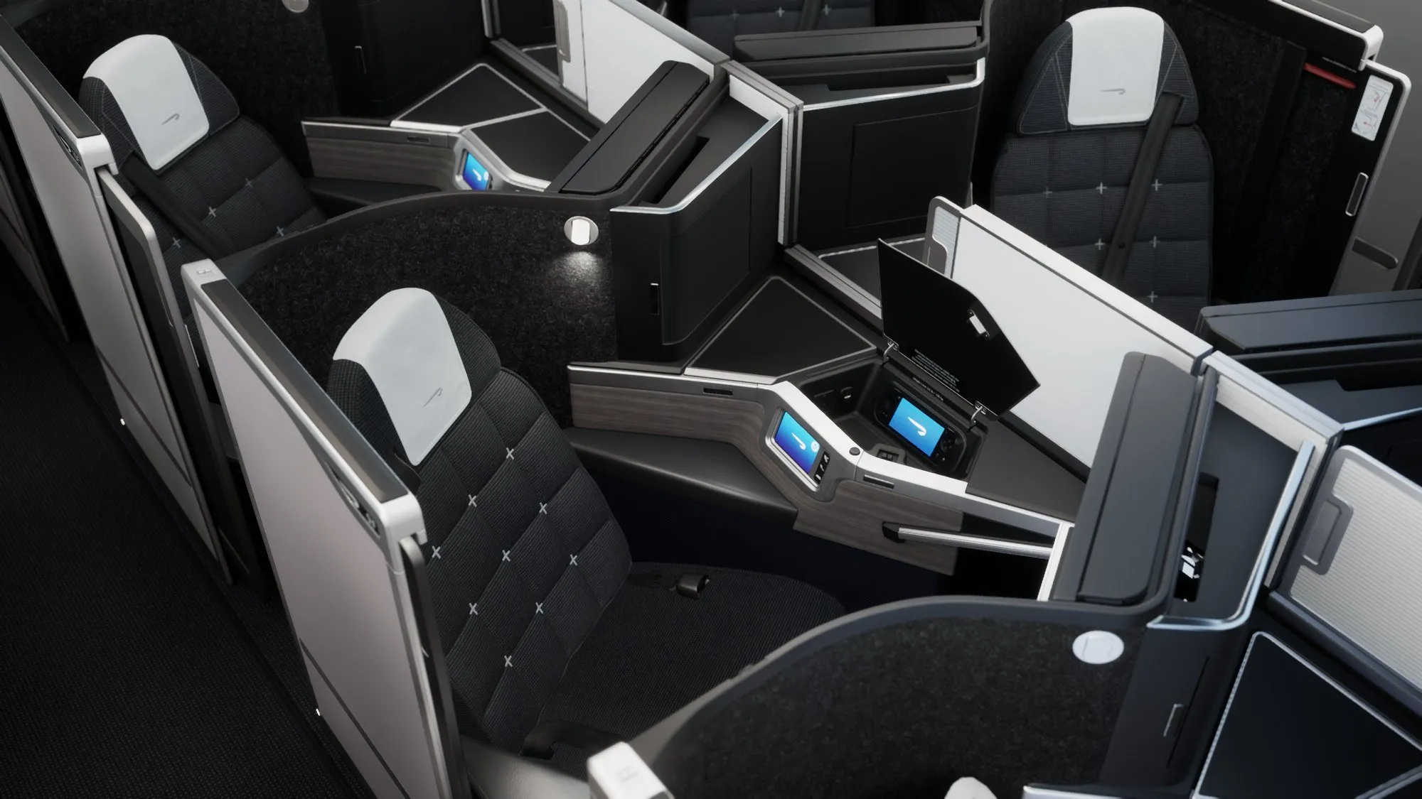 Rows of BA Club Suites on a 777, each with its own door