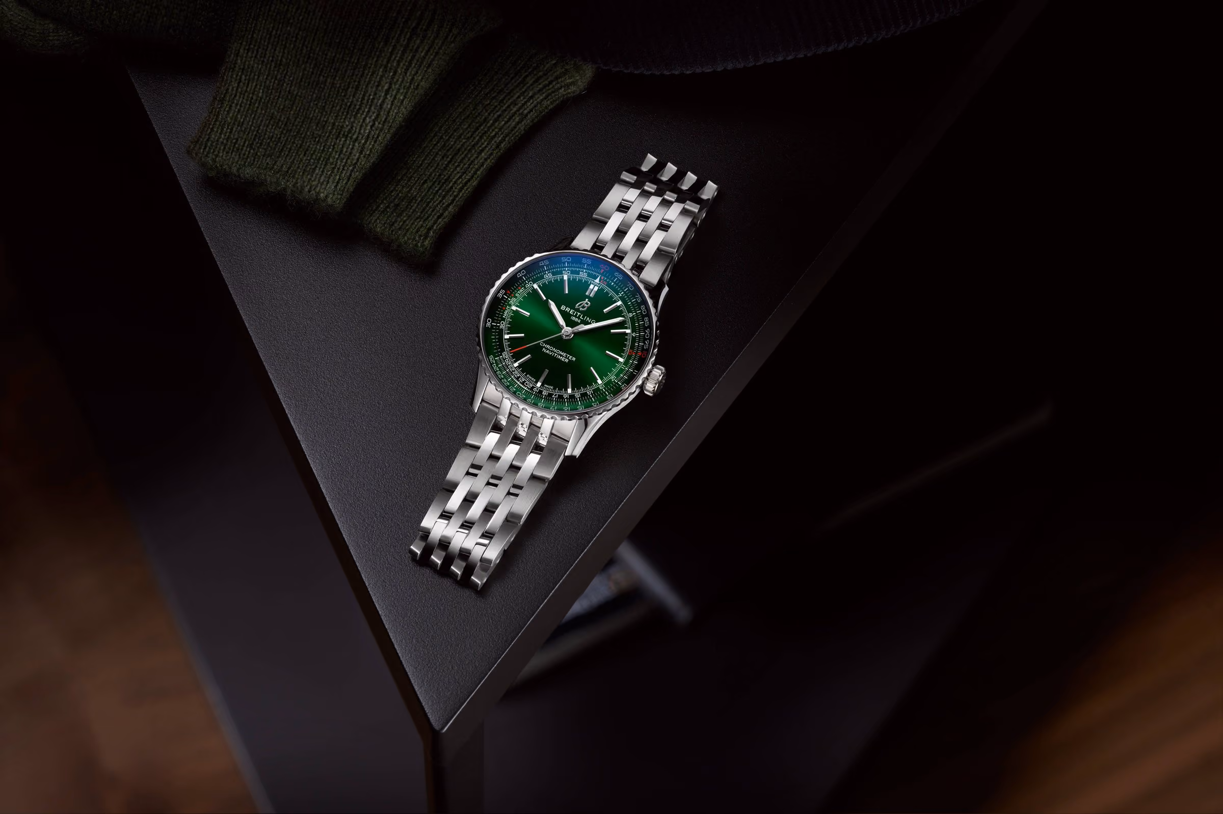 The Breitling Navitimer Automatic 41 with a green dial, on the wrist
