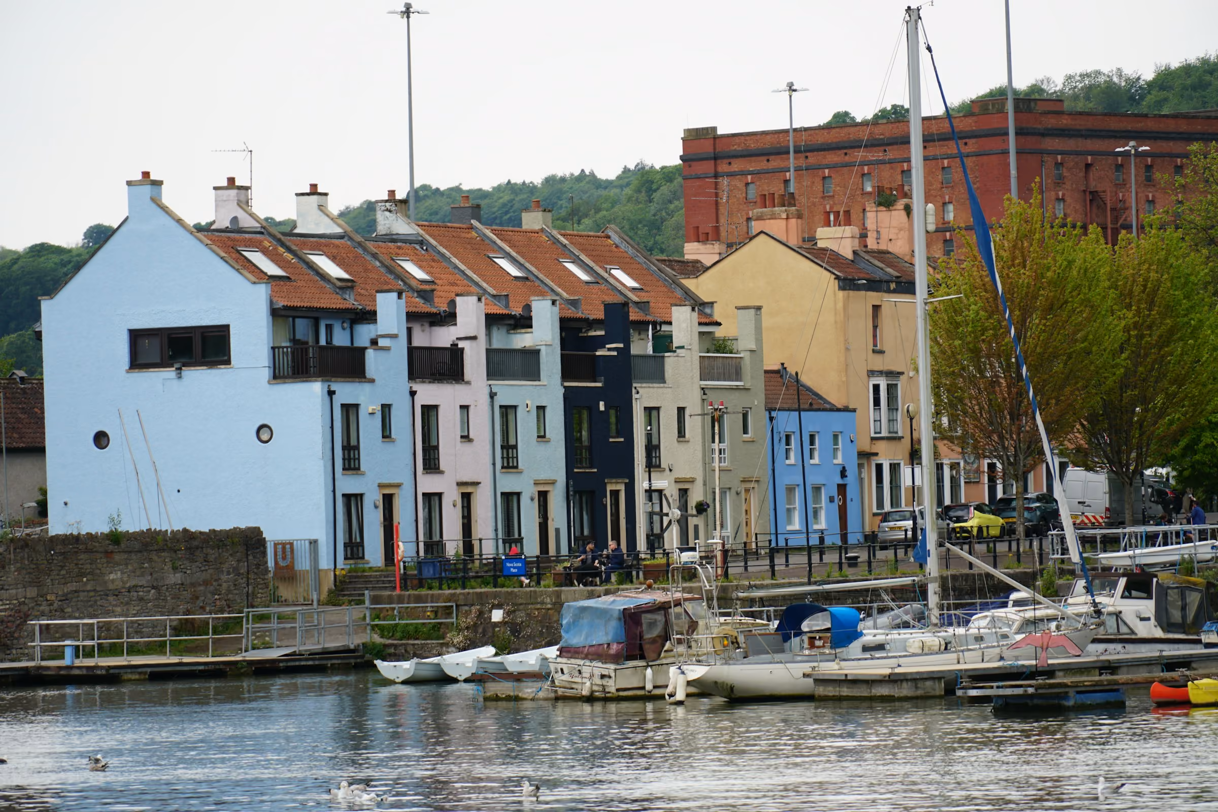 Harbourside houses and moored boats in Bristol