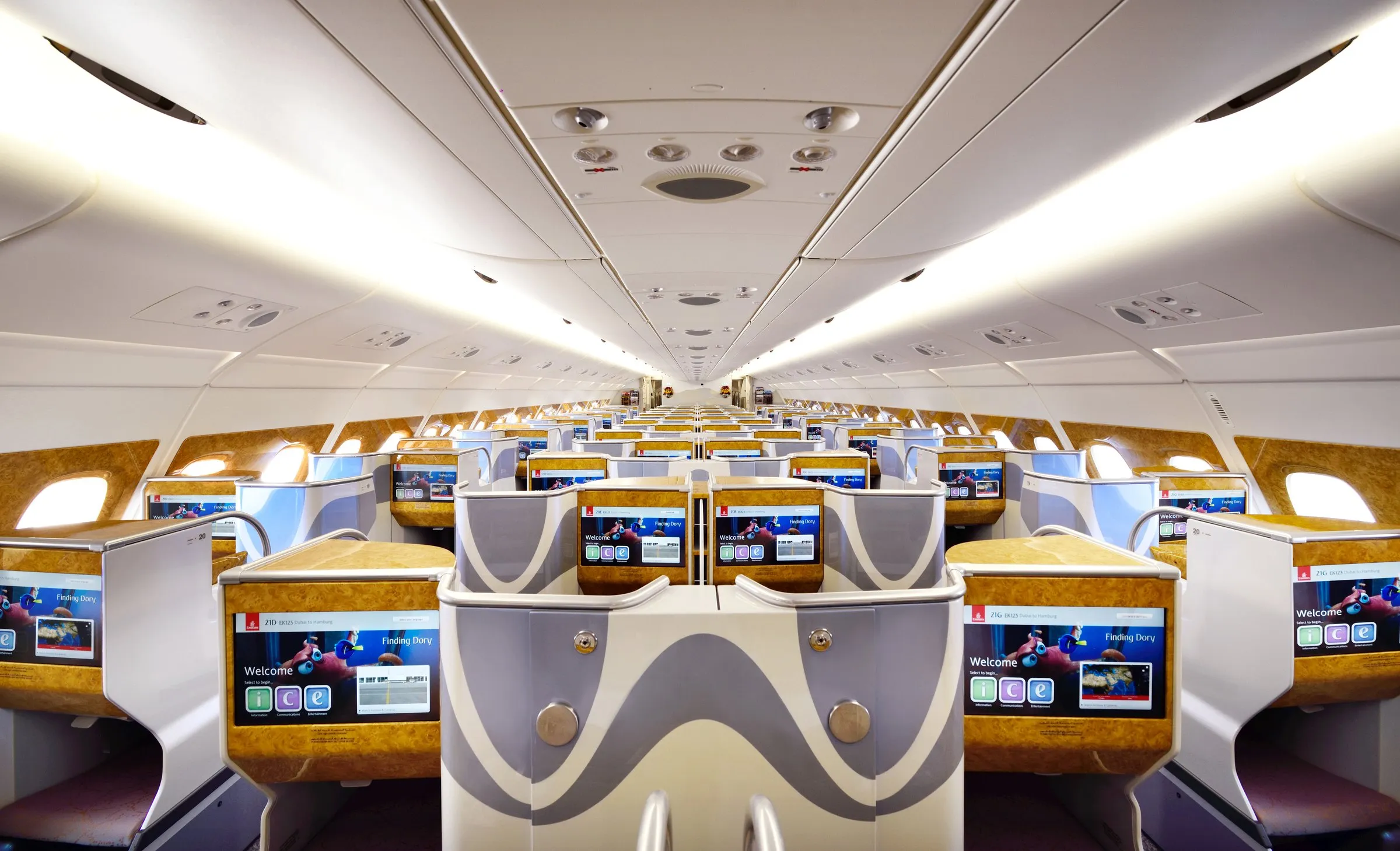 The Emirates A380 business class cabin on the upper deck, one of the best business class airlines from the UK