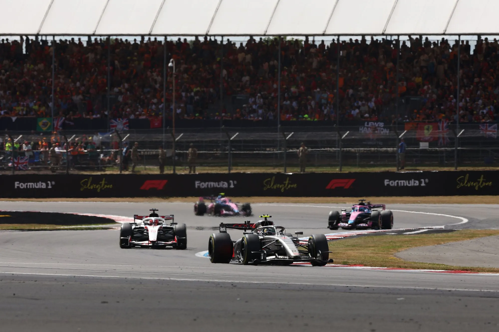 Formula 1 cars racing at Silverstone during the British Grand Prix