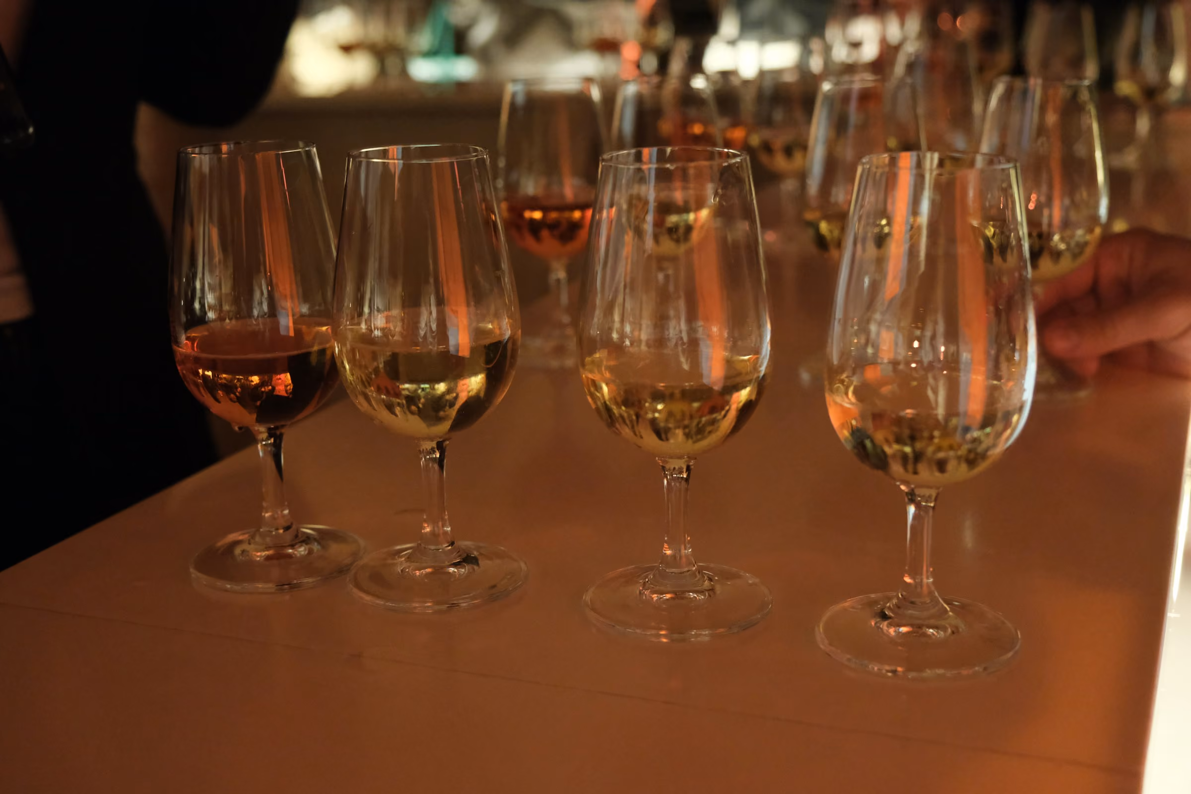 A row of nosing glasses at a whisky tasting