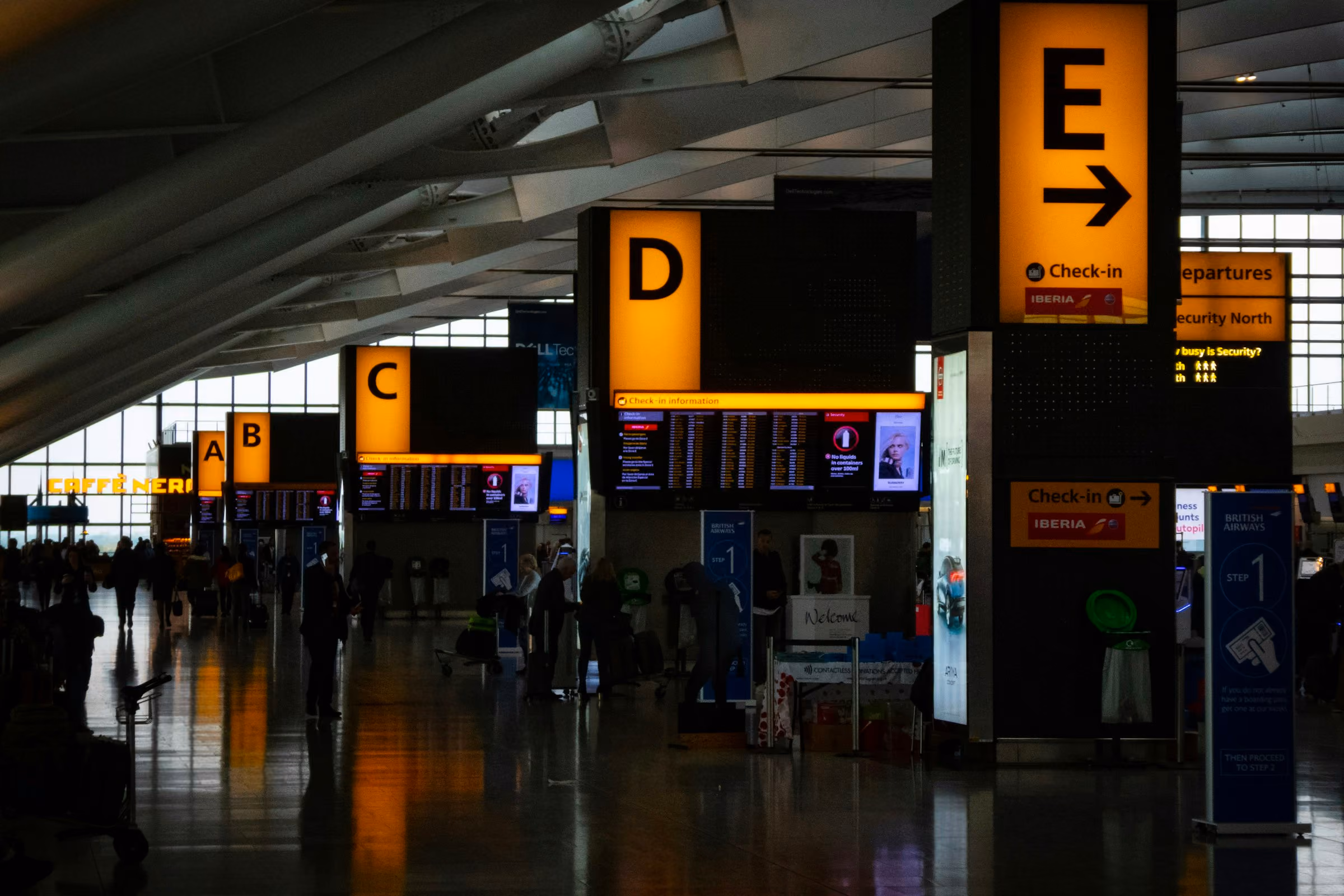 Departure signs for gates C, D and E in Heathrow Terminal 5