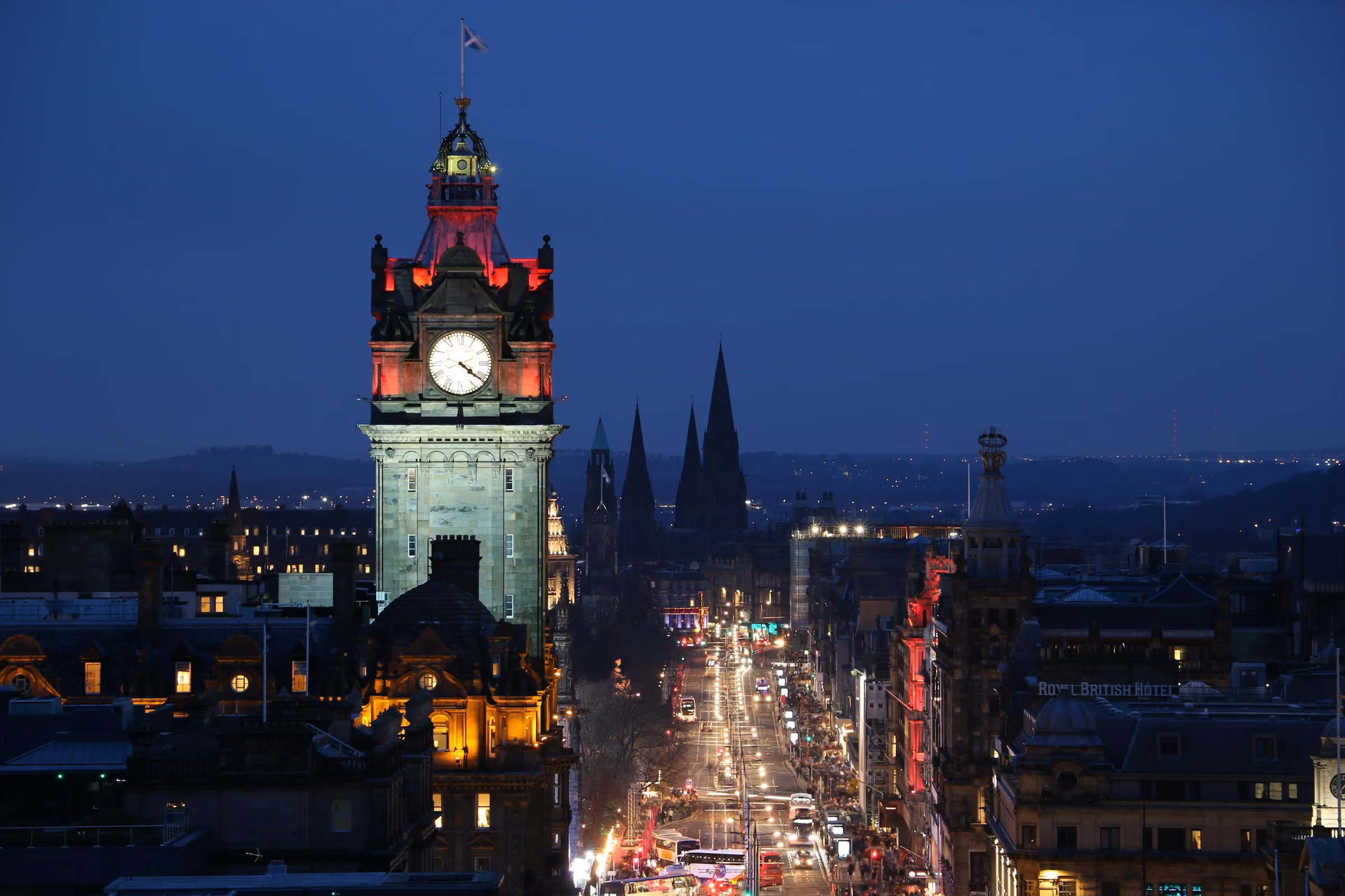 The Balmoral clock tower above Princes Street at dusk