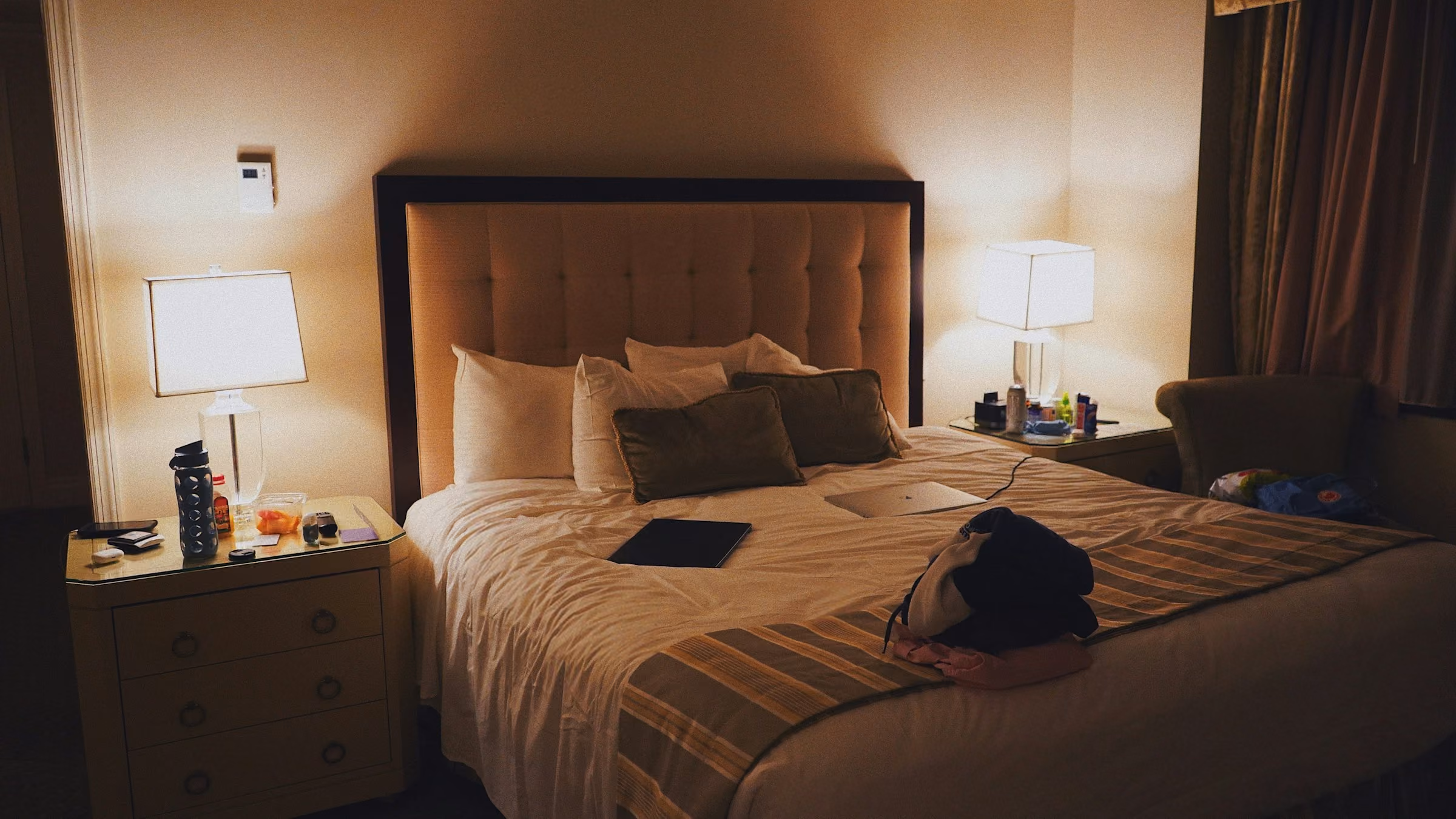 A hotel room at night, where a watch belongs in the safe