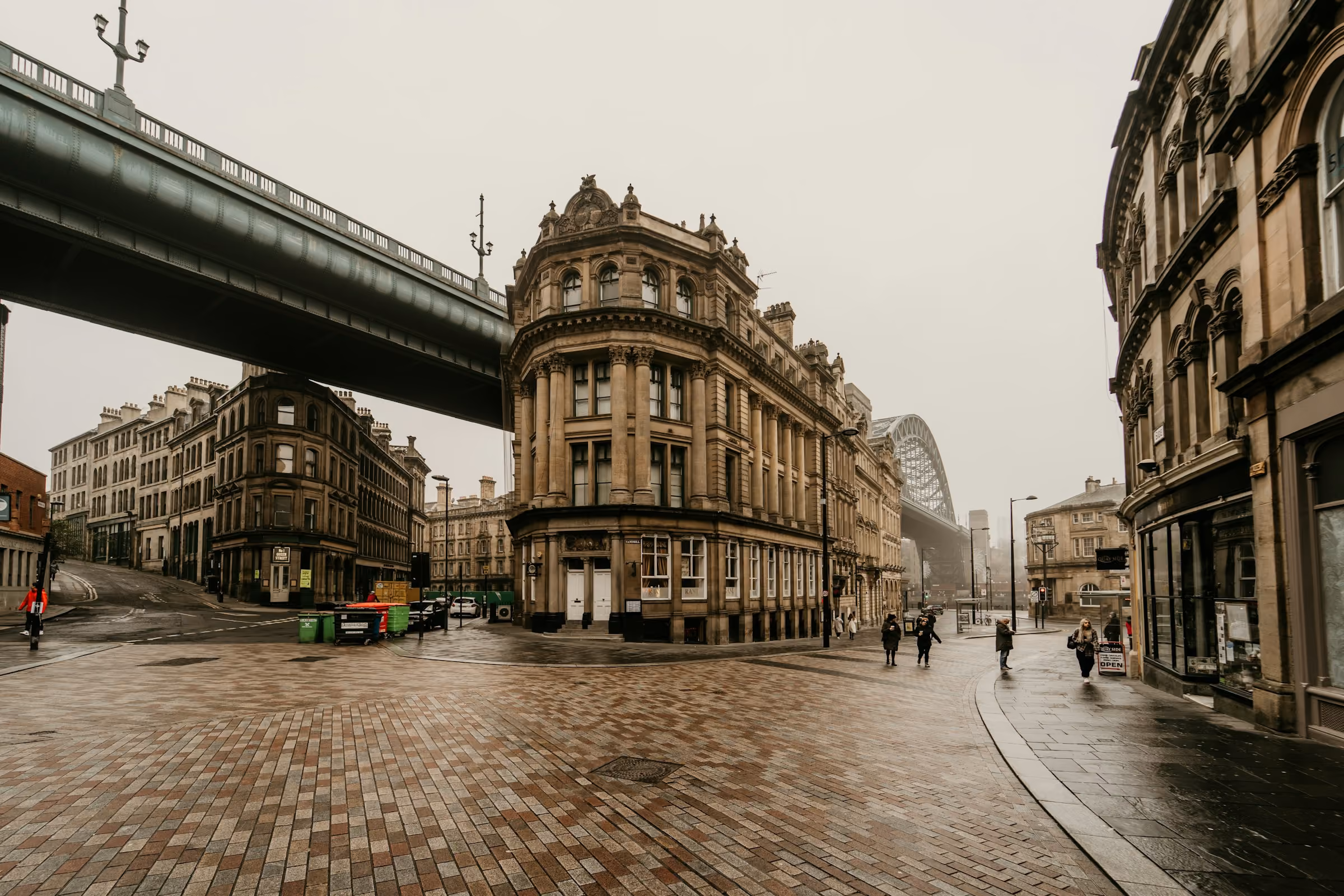 Newcastle's stone streets under the Tyne Bridge approach