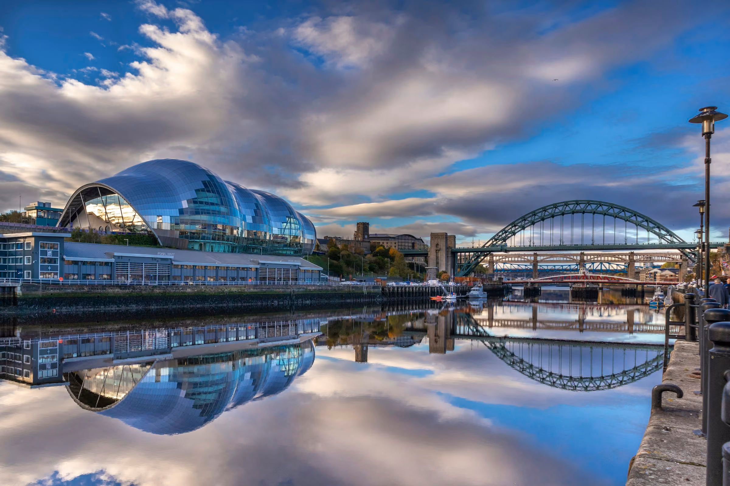 The Sage Gateshead and the Tyne bridges reflected in the river
