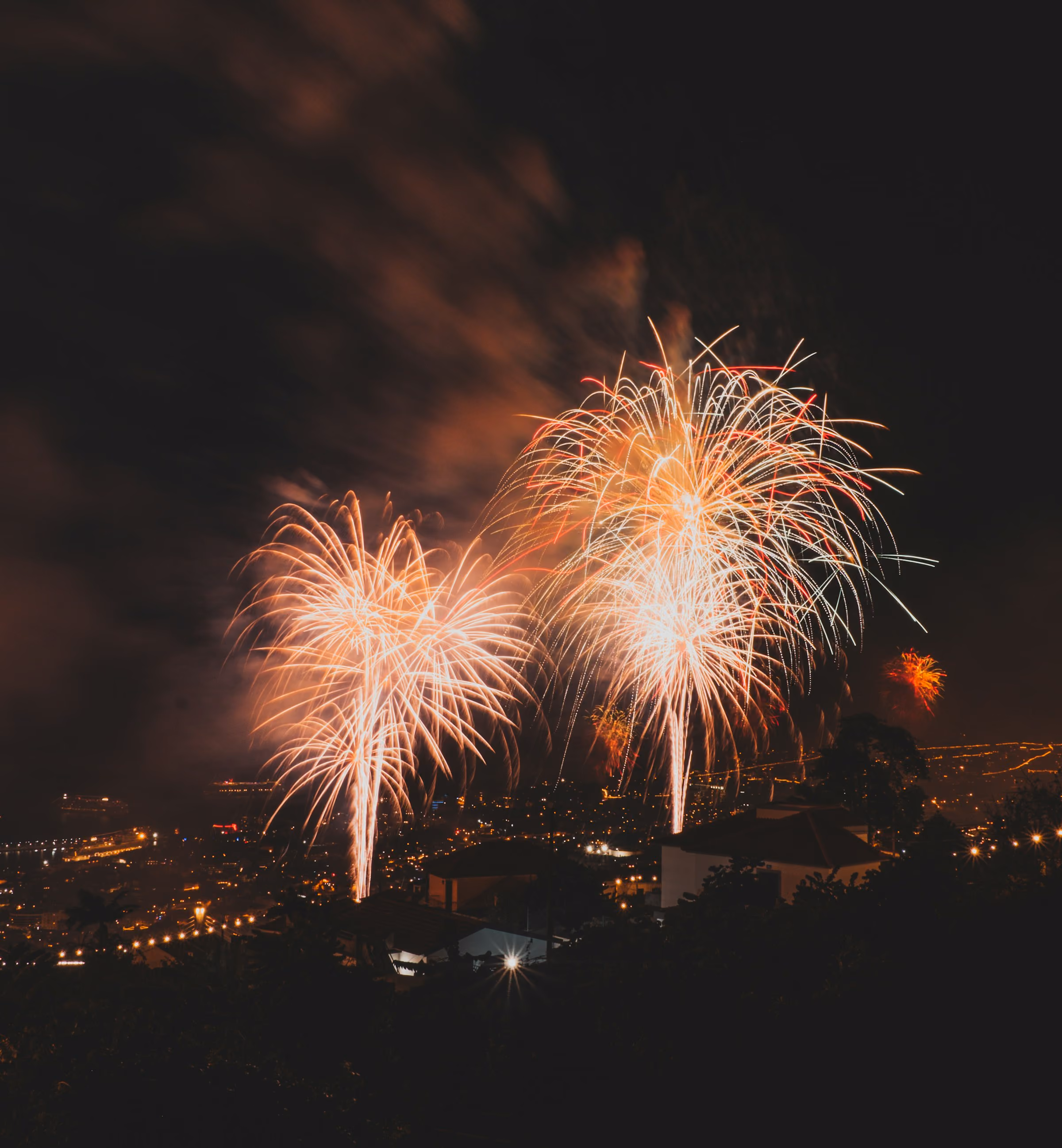 Fireworks above the lights of Funchal