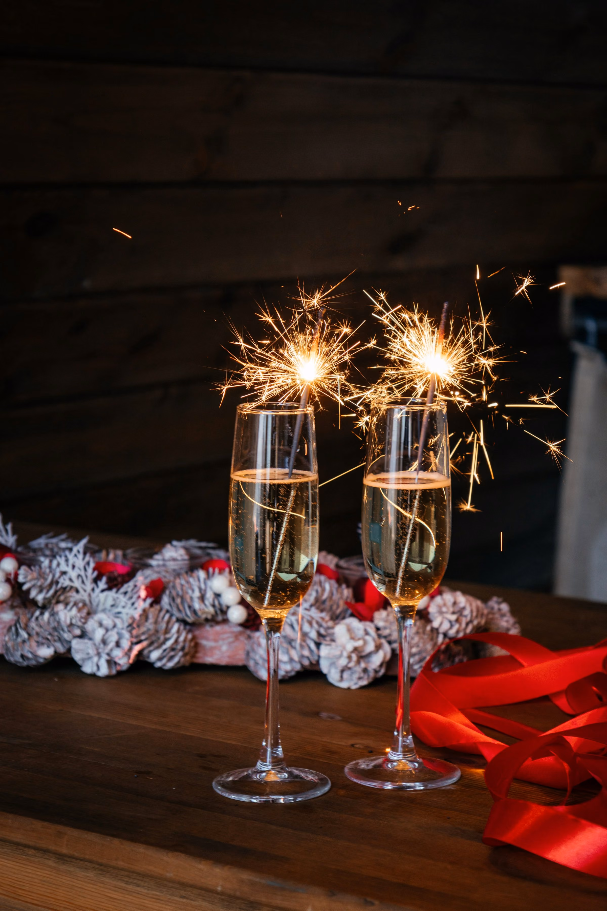 New Years Eve breaks: two Champagne flutes with lit sparklers