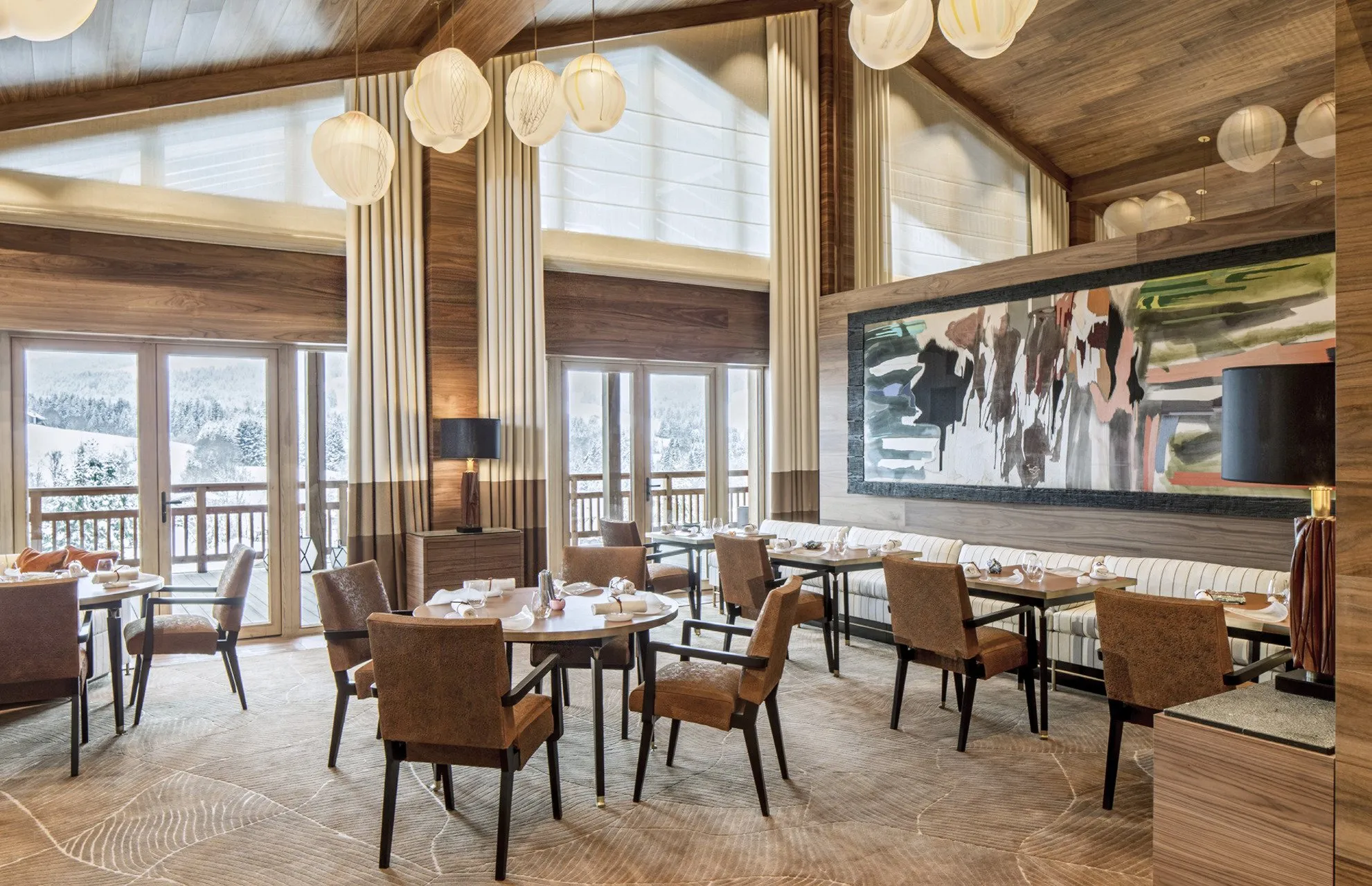 The dining room at Four Seasons Megève, with windows onto the snow