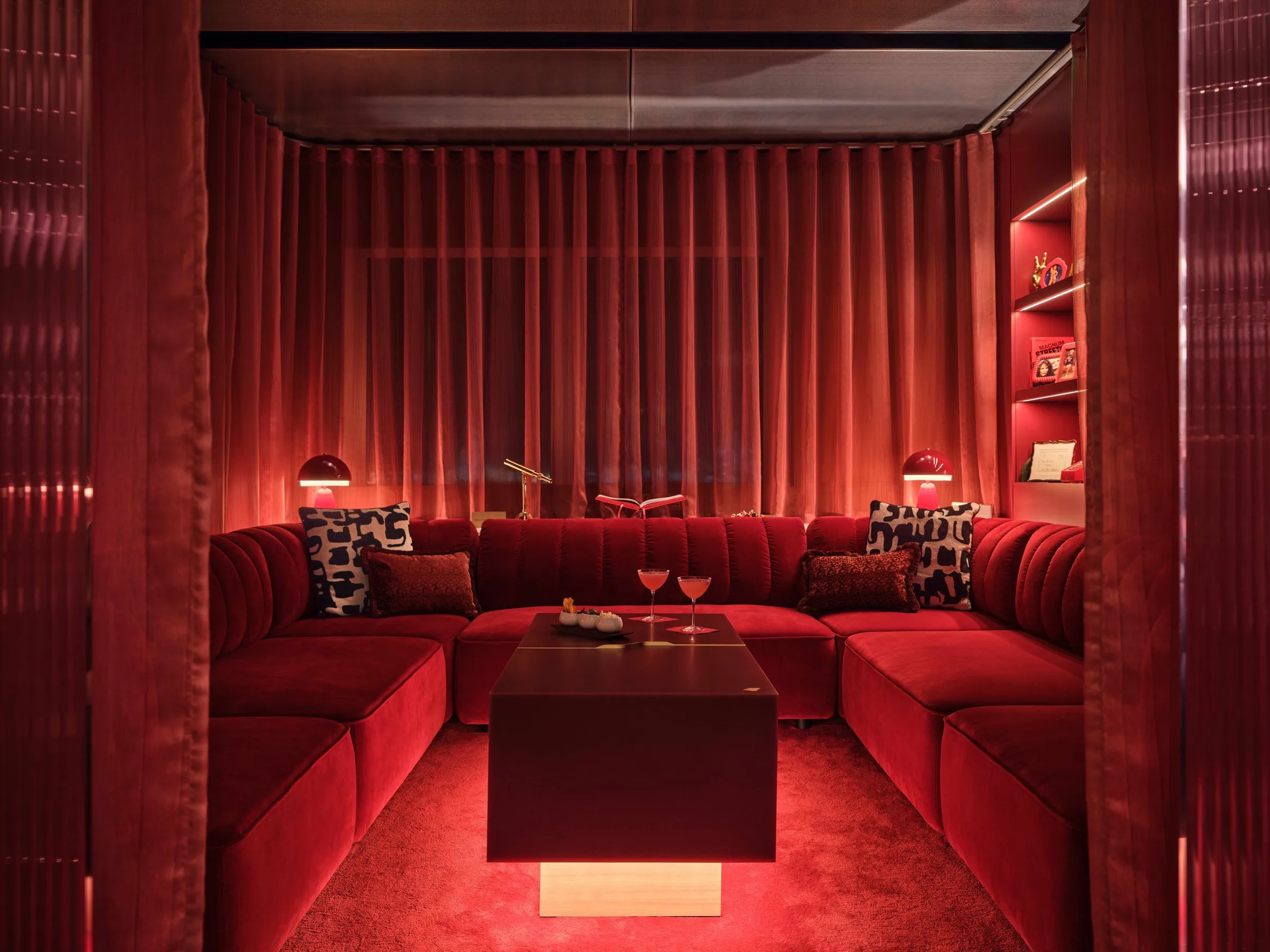 The Royal Box, a red velvet private booth in the Virgin Clubhouse