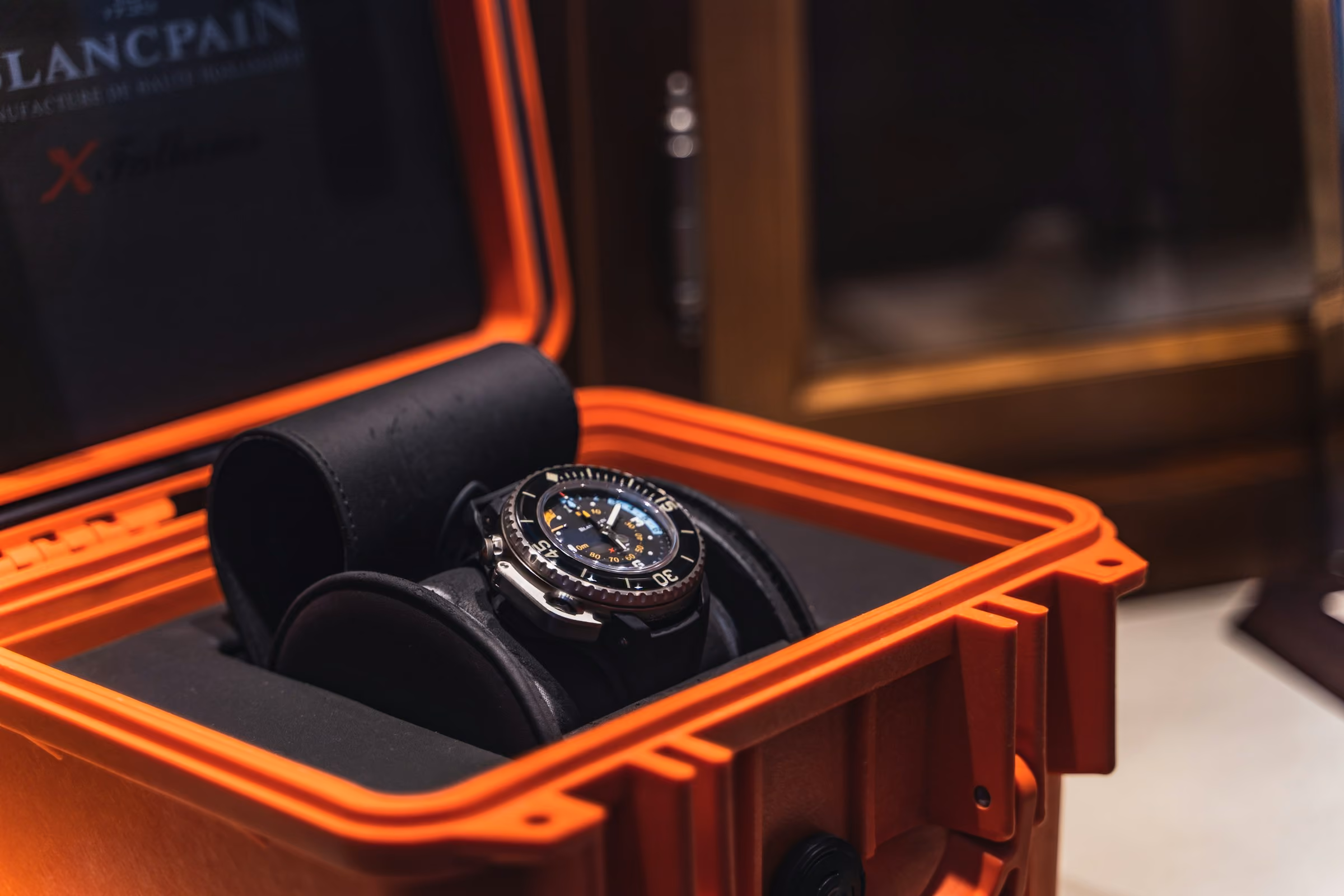 A watch resting in an open box