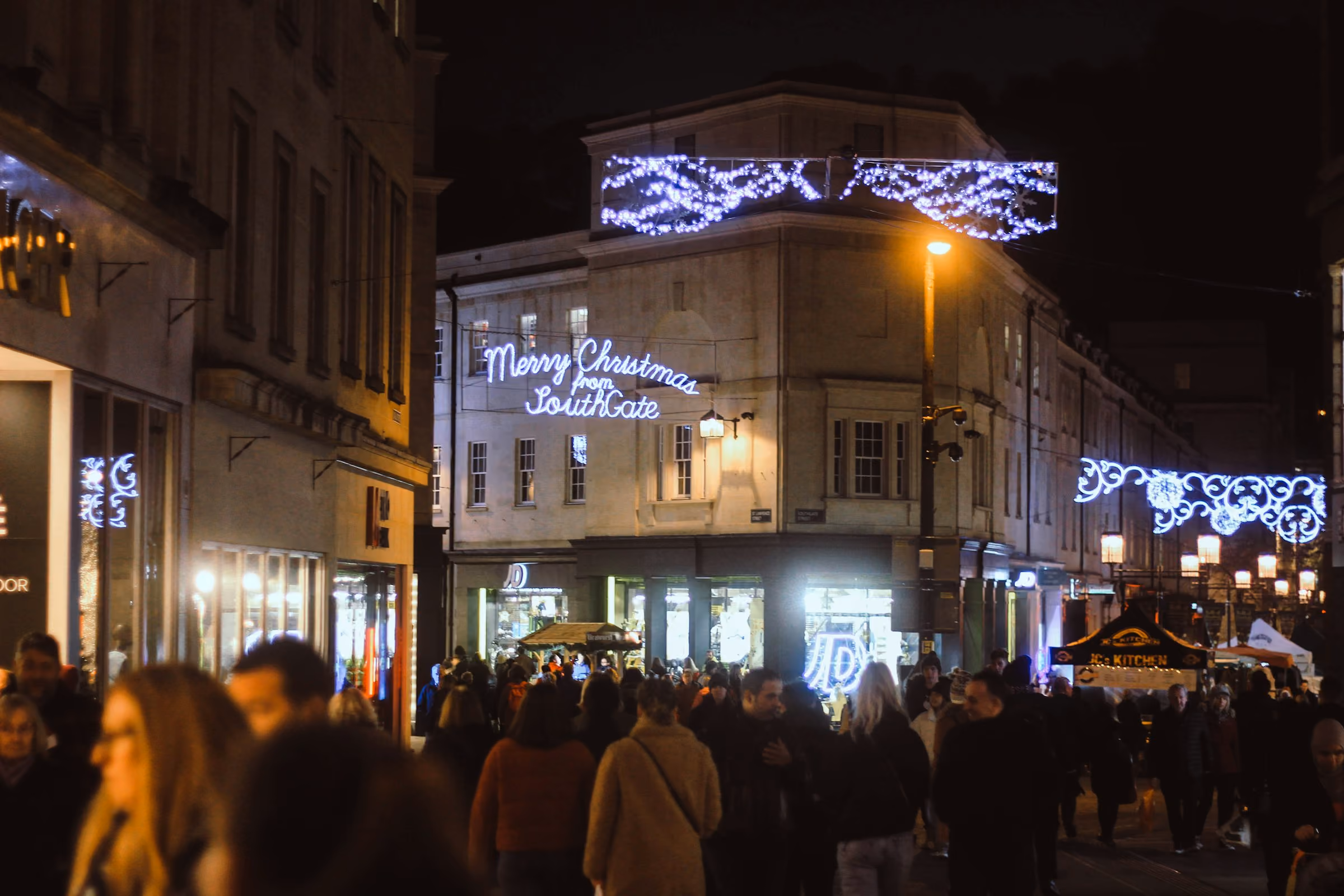 Christmas lights strung across a Bath street