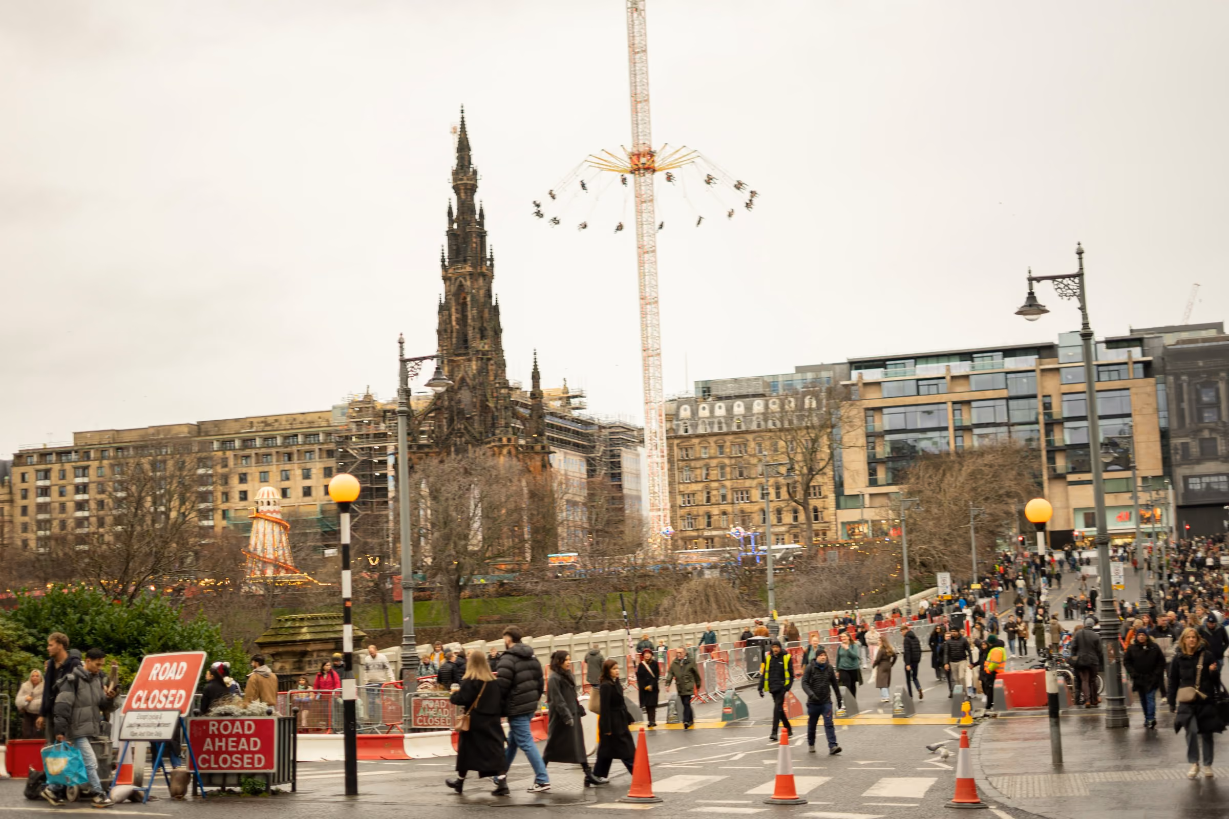 The Scott Monument and the Star Flyer ride in Edinburgh