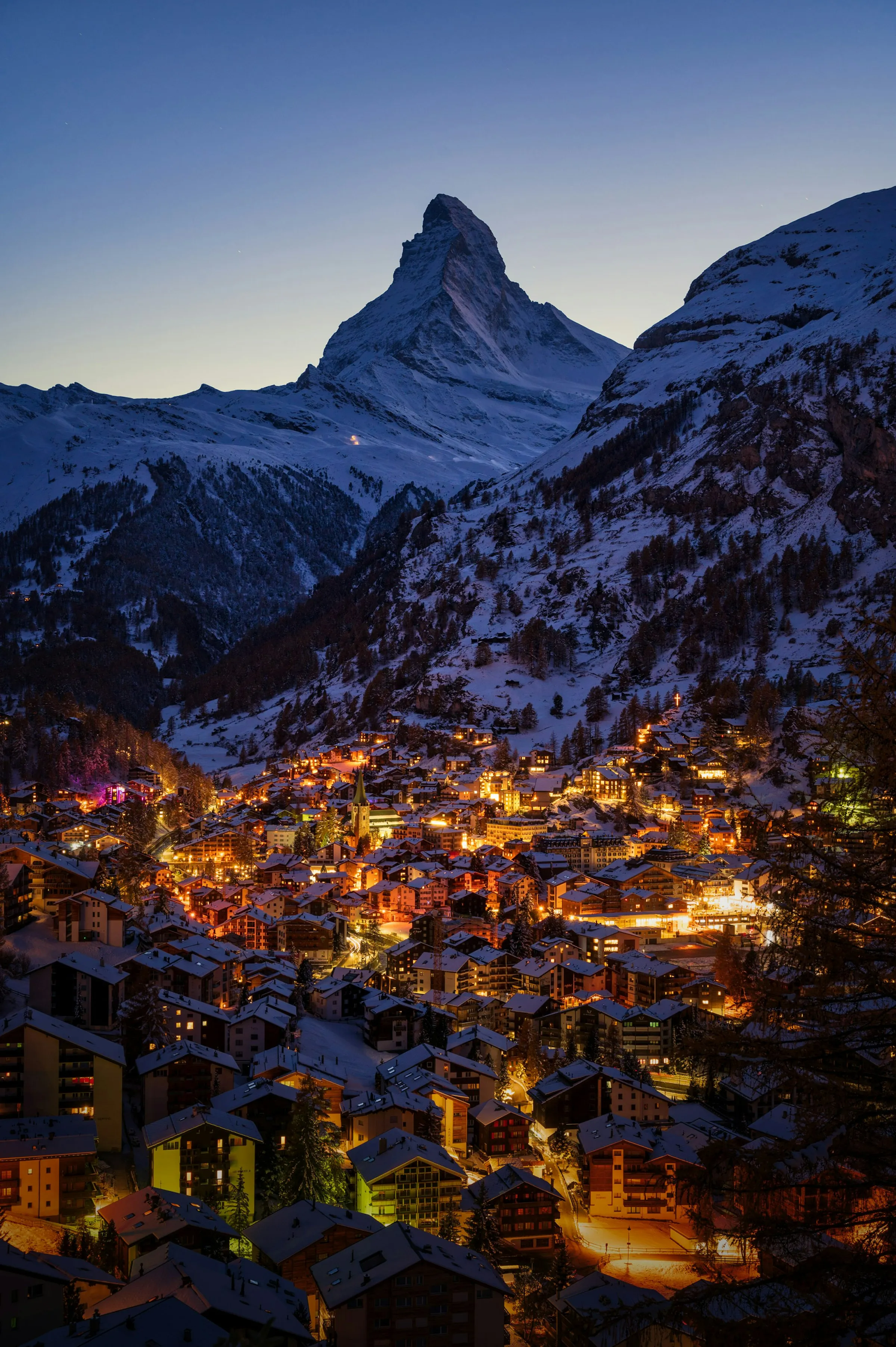 The Matterhorn at dusk above Zermatt, home to one of the best ski in ski out hotels in the Alps